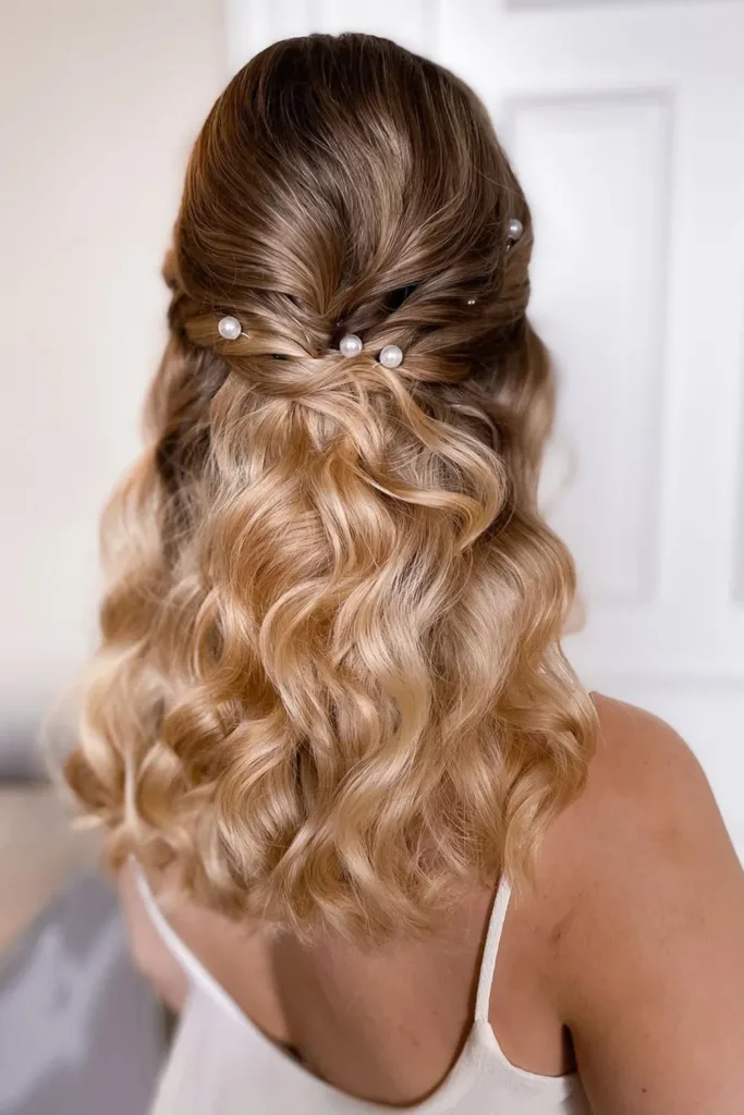 half up half down prom hairstyle simple hairstyle pearl hair decor